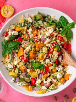 Lemon orzo salad with feta, roasted rainbow vegetables, cherry tomatoes, basil and toasted pine nuts