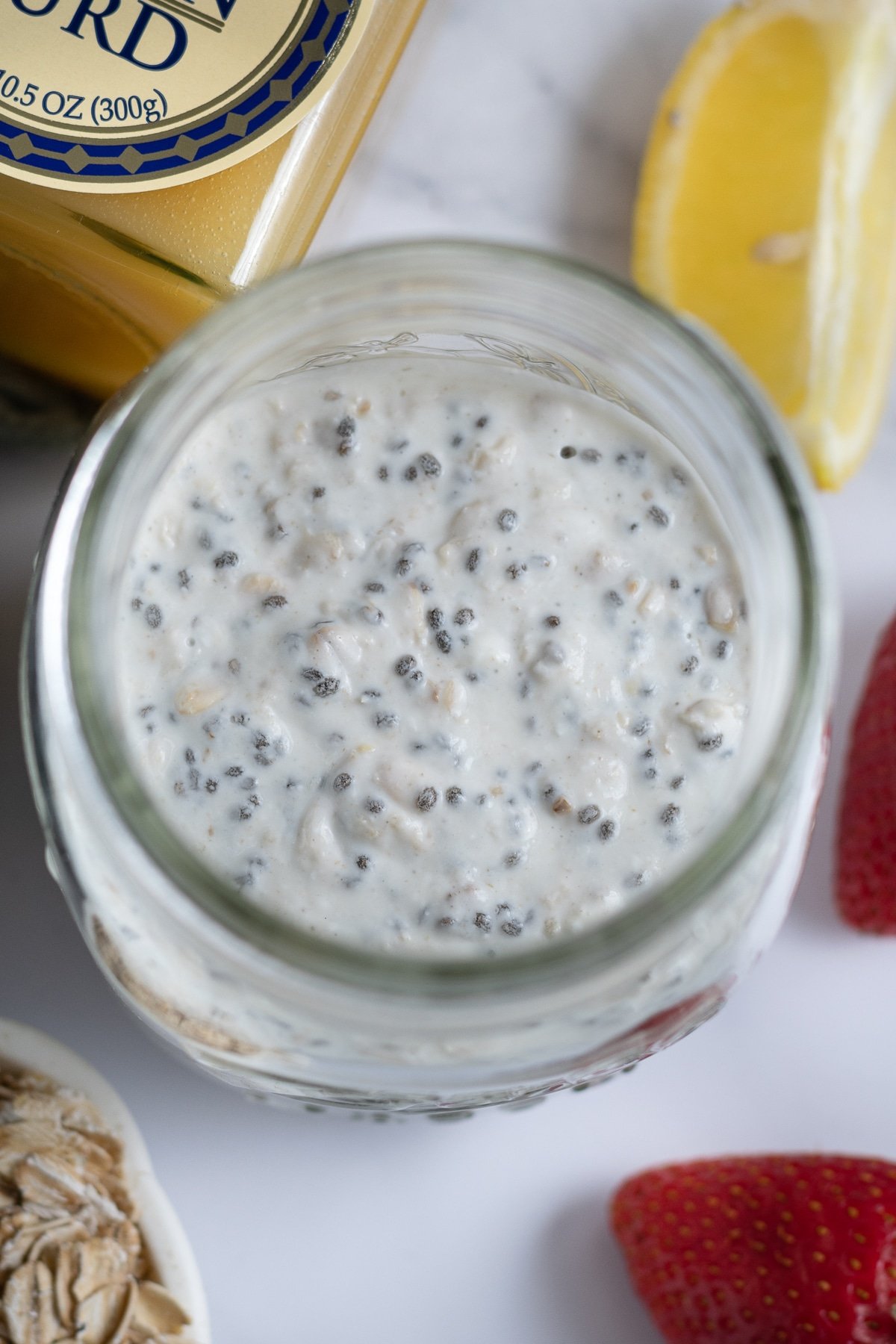 texture of rolled oats plus chia seeds plus Greek yogurt in jar