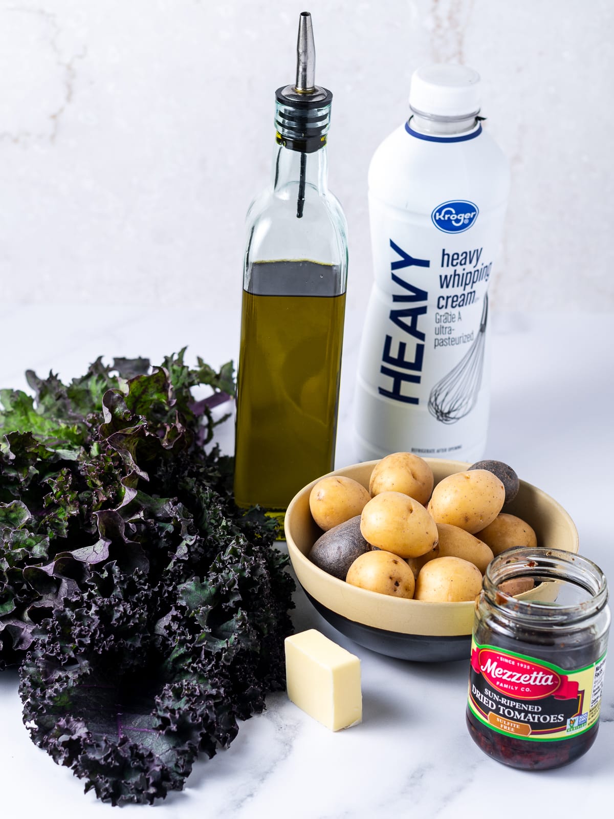 ingredients needed to make the side dishes: rustic mash and sautéed kale