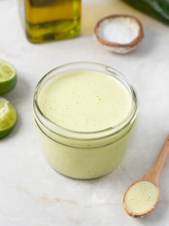 small jar with creamy jalapeno dressing