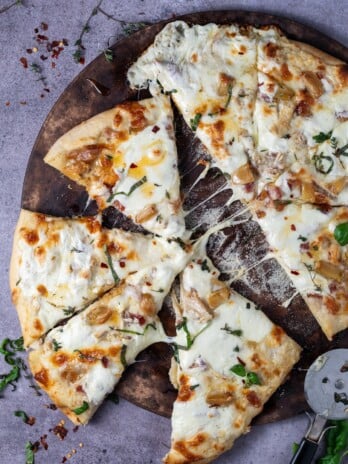 roasted garlic pizza with a cheese pull