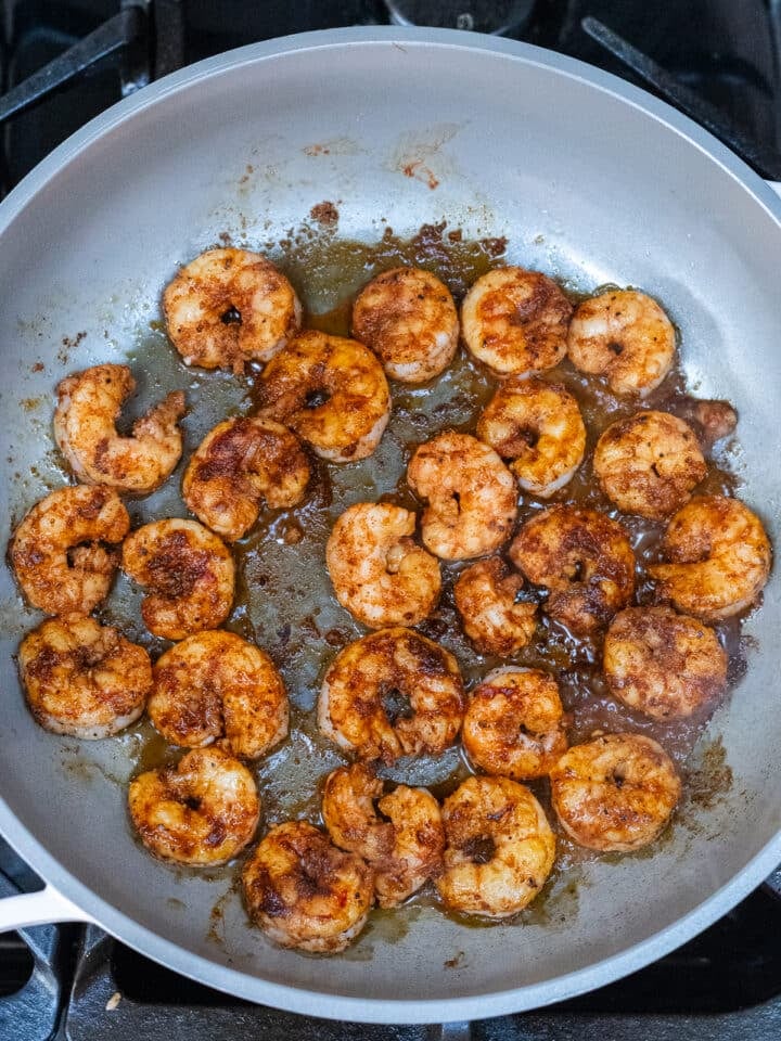 pan with seasoned, cooked shrimp