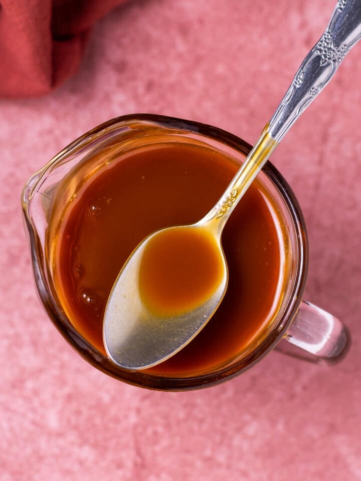 spoon with caramel sauce