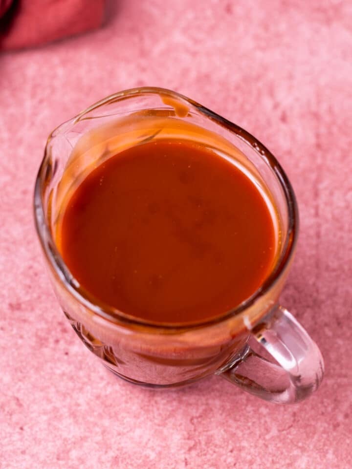 small pitcher of salted caramel syrup