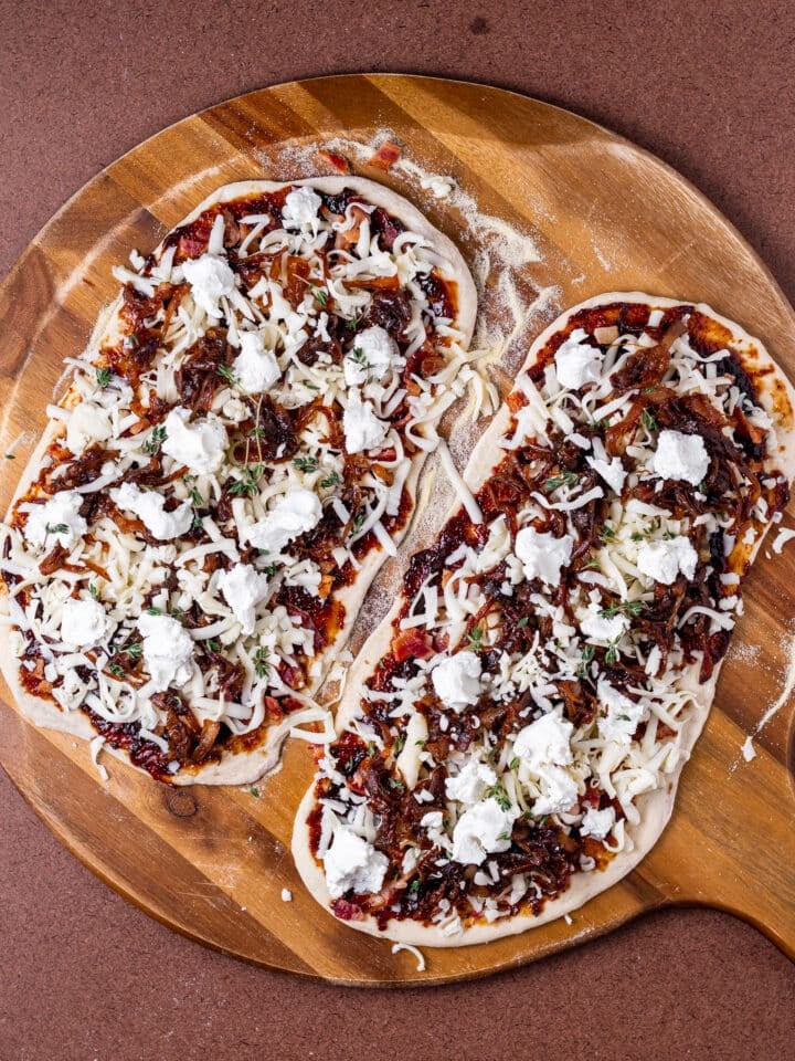 unbaked flatbreads topped with goat cheese and fresh thyme