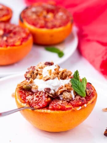 brûléed grapefruit topped with fresh mint, yogurt and granola