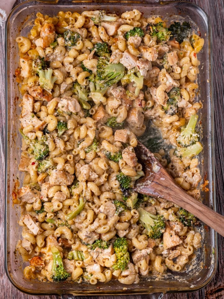 casserole dish with featured recipe and a wooden spoon