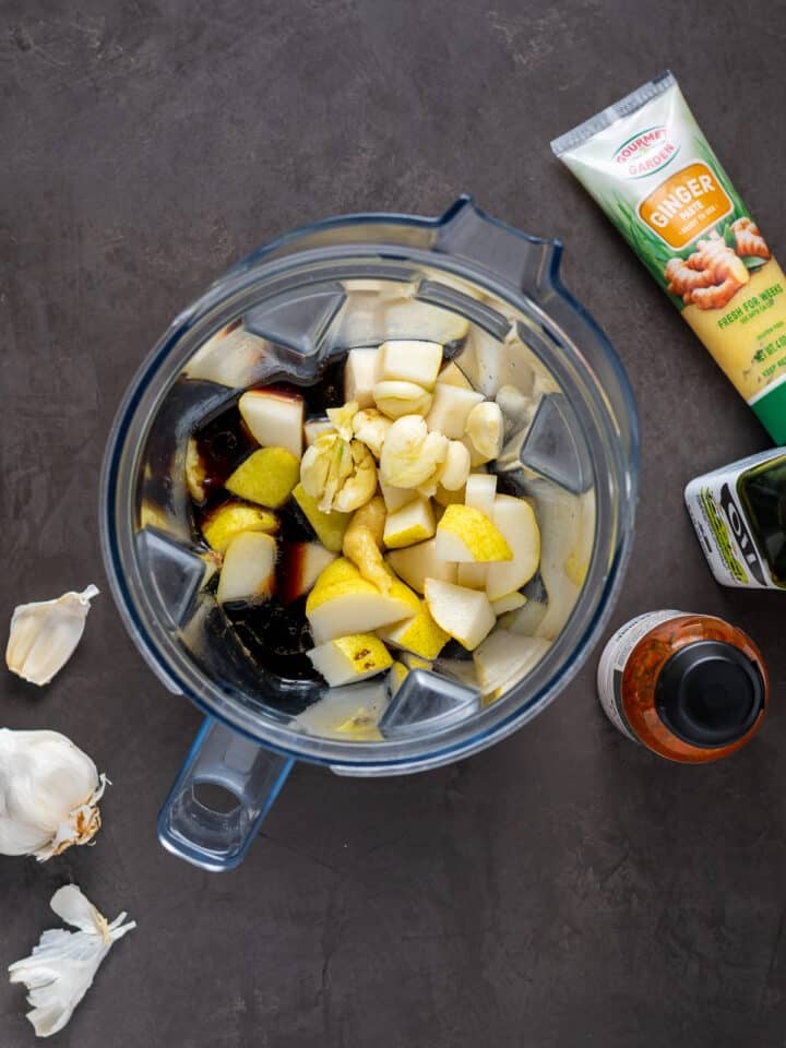 blender with soy sauce, ginger, garlic, brown sugar, sesame oil and pears
