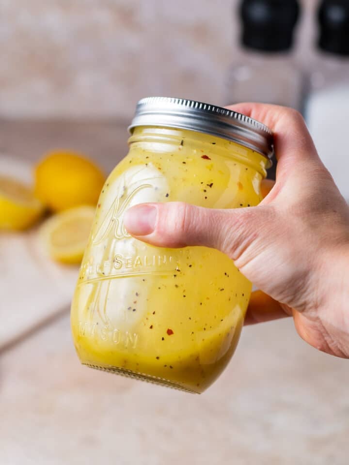 hand shaking together the dressing