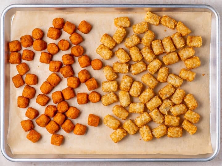 sweet potato tots and regular potato tots on a sheet pan