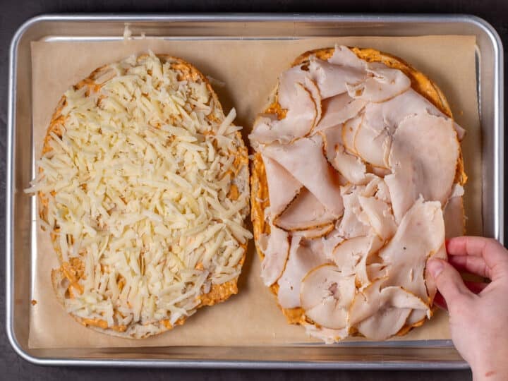 cheese and chicken added to the sandwich