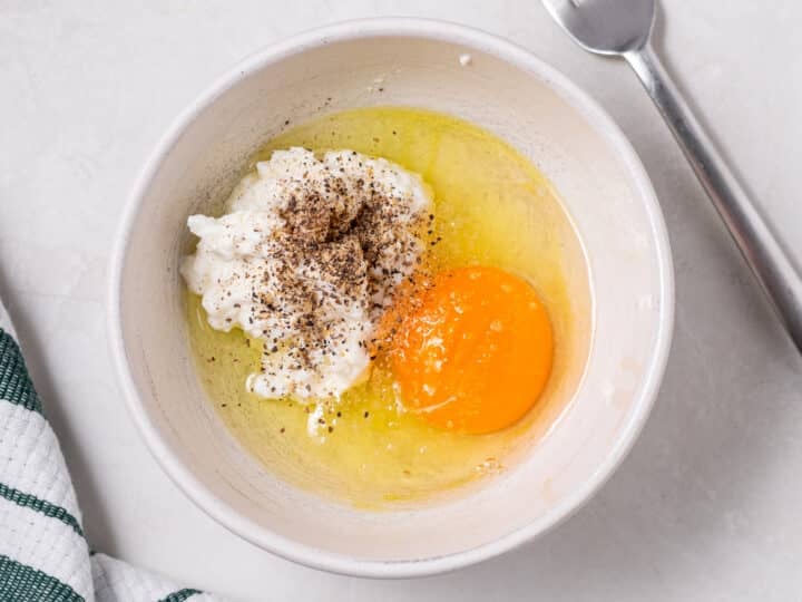 egg and cottage cheese in a small white bowl