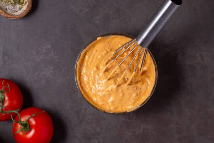 whisked together sun-dried tomato pesto mayo in a small bowl