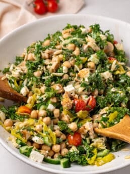 large white bowl with kale, chickpea and chicken salad
