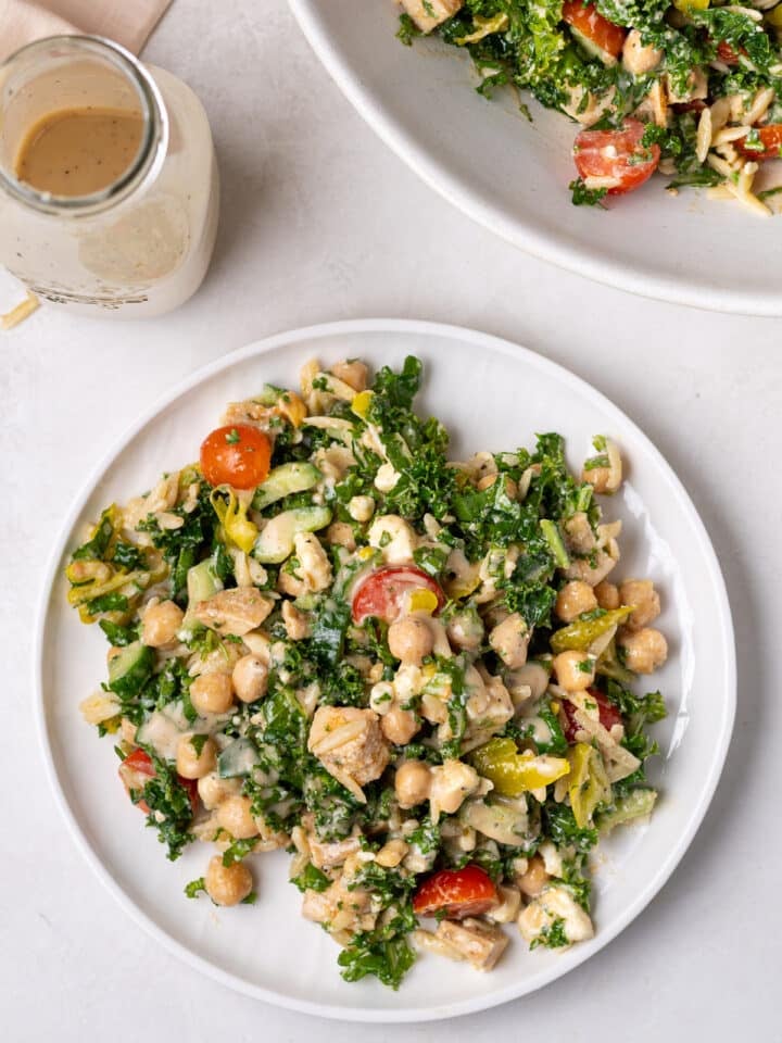 chicken and chickpea salad on a white plate