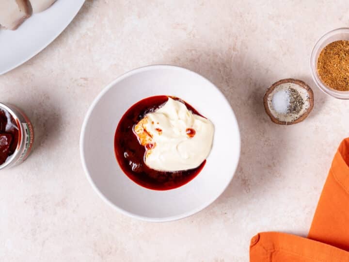 mayo and adobo sauce from chipotle peppers in adobo in a small white bowl