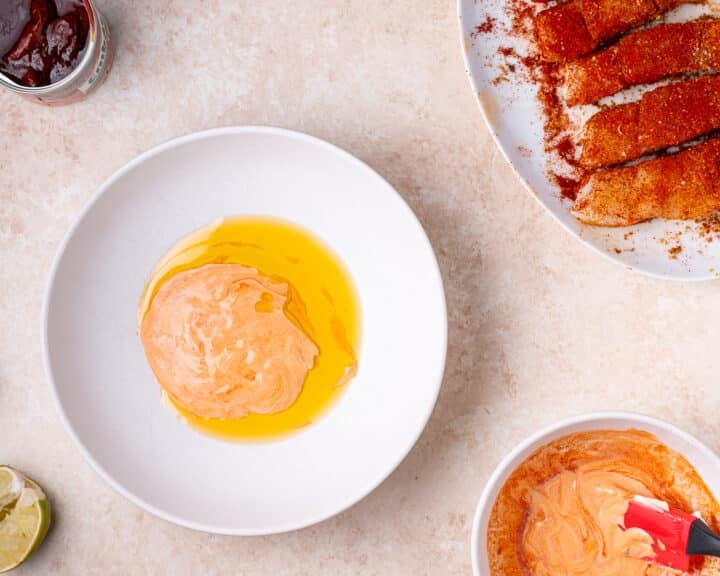 chipotle sauce and olive oil in a shallow white bowl