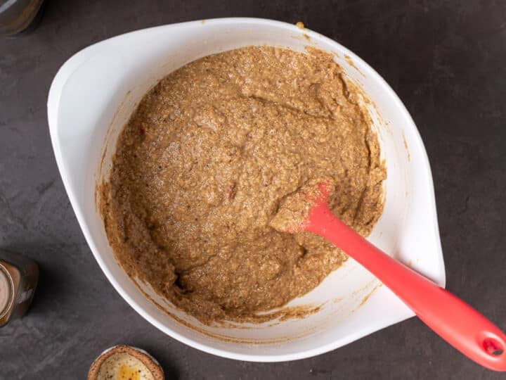mixed muffin batter in a white bowl