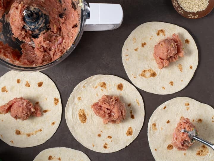scoops of ahi tuna mixture on tortillas