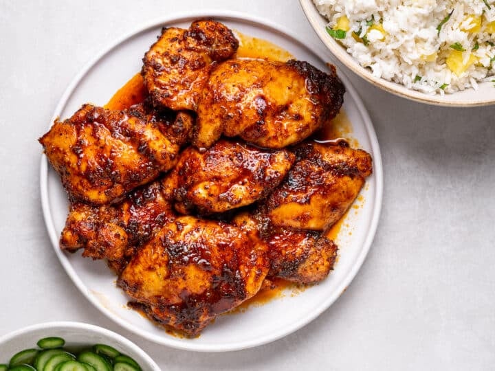 Overhead view of roasted chili lime chicken thighs served on a plate