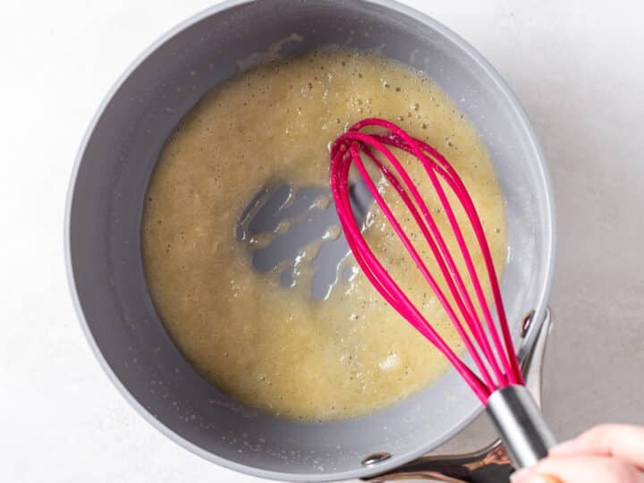 Garlic butter and flour mixture whisked until smooth and lightly thickened
