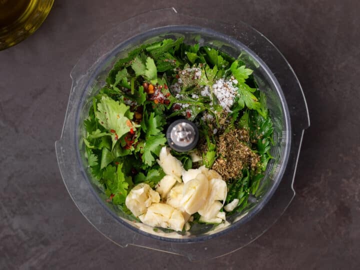 garlic and fresh herbs in a food processor