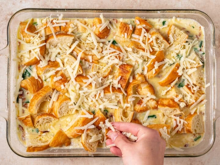 sprinkling cheese on top of egg bake