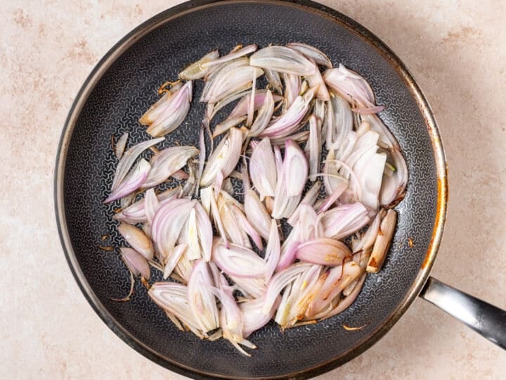 skillet with shallots