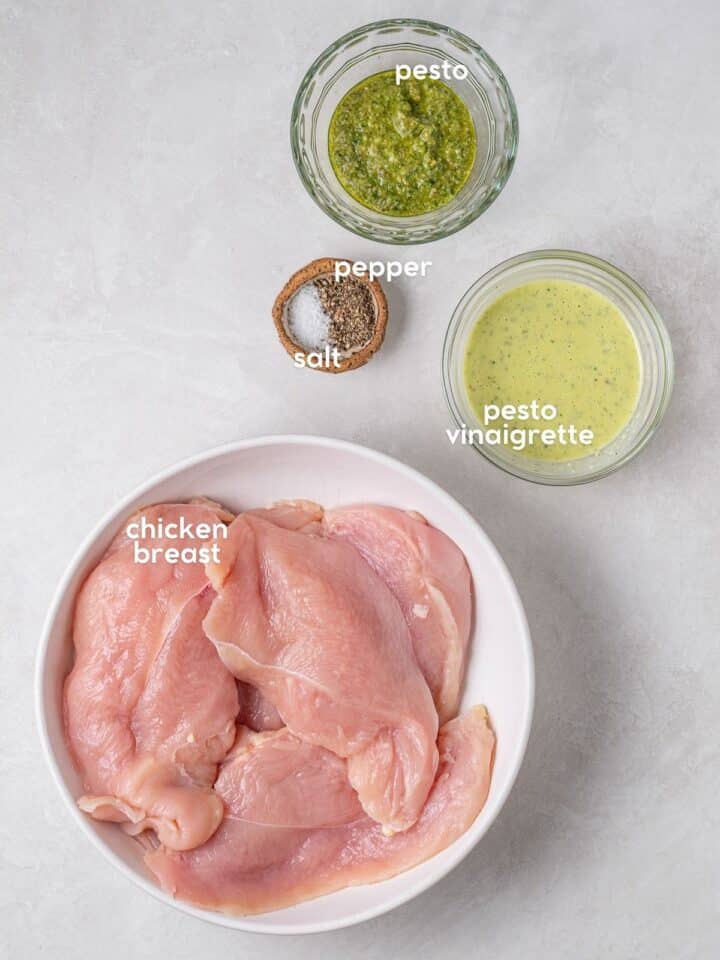 Labeled ingredients for recipe, including chicken breast, pesto vinaigrette, pesto, salt, and pepper