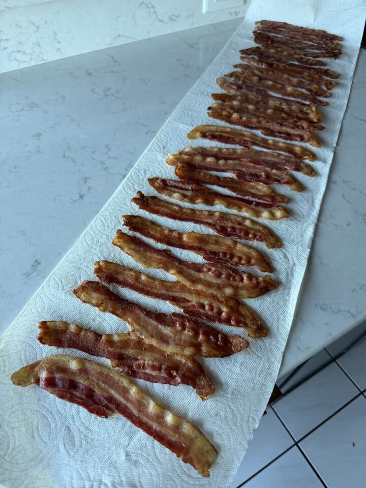 cooked bacon on paper towels to make some of the best camping food