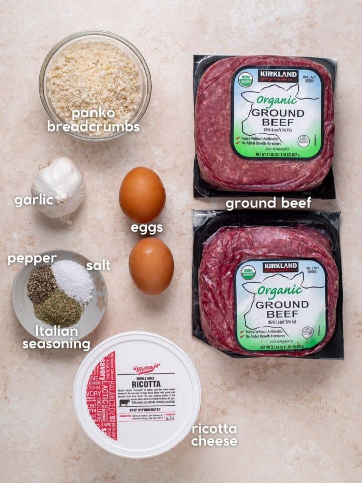 Ingredients for homemade meal prep meatballs including ground beef, ricotta, eggs, garlic, panko and seasonings.