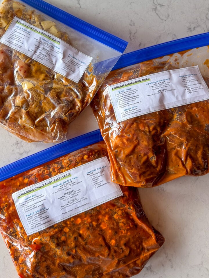 Freezer meal prep bags with chicken and potato curry, Korean shredded beef and taco soup